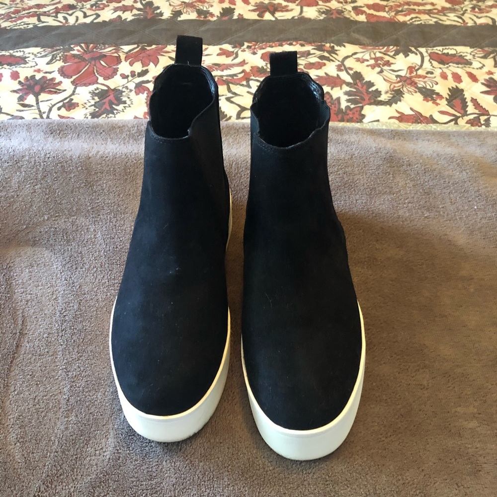 Steve Madden high wedge sneakers.